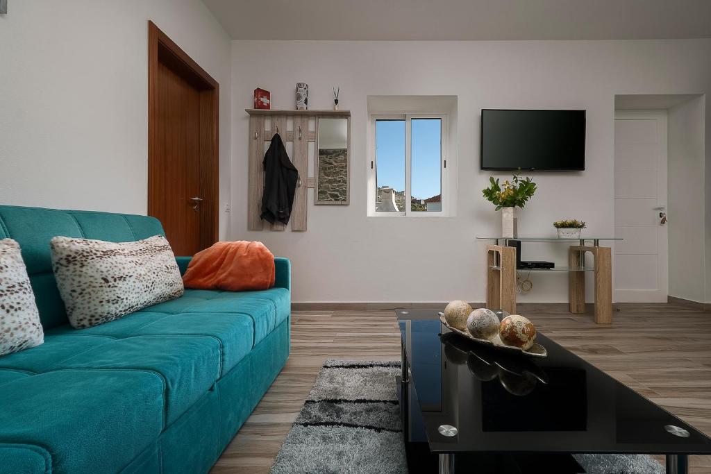 TV a/nebo společenská místnost v ubytování Casa Tiana Madeira