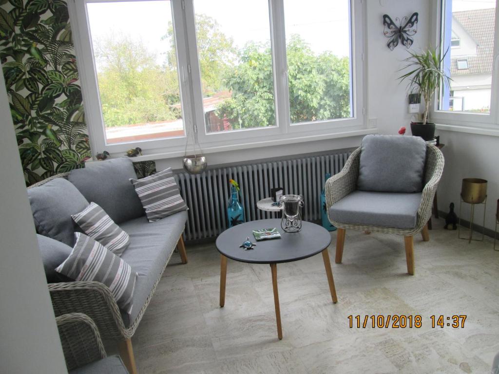 Posezení v ubytování Gîte du Coq