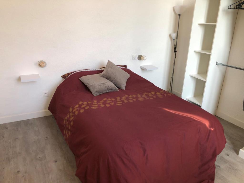 Postel nebo postele na pokoji v ubytování chateau fourclins