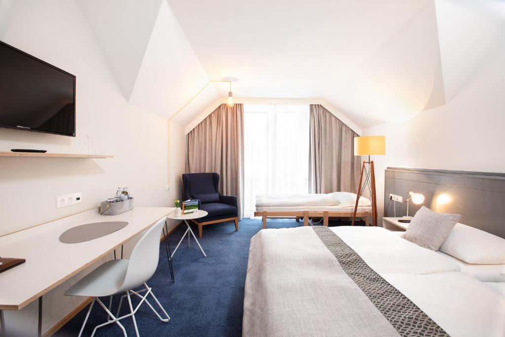 Postel nebo postele na pokoji v ubytování Hotel Restaurant Höldrichsmühle