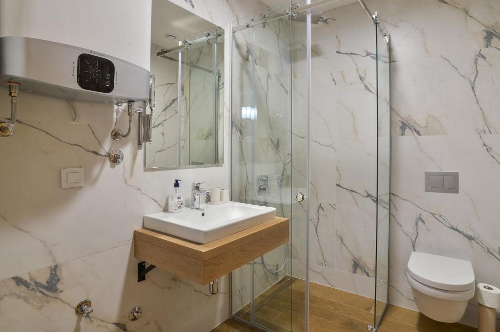 Un baño de Apartman AMIGO & Spa