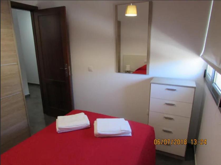 Postel nebo postele na pokoji v ubytování Seifía BB