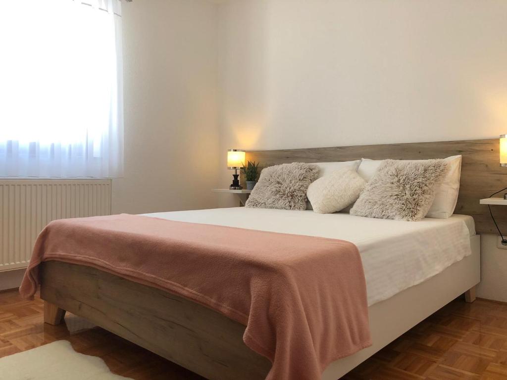 Posteľ alebo postele v izbe v ubytovaní Apartment Golden Fields