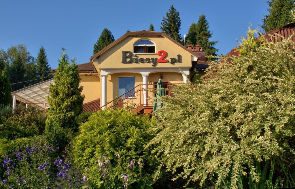 a house with a sign that reads bier at Biesy2 in Wetlina