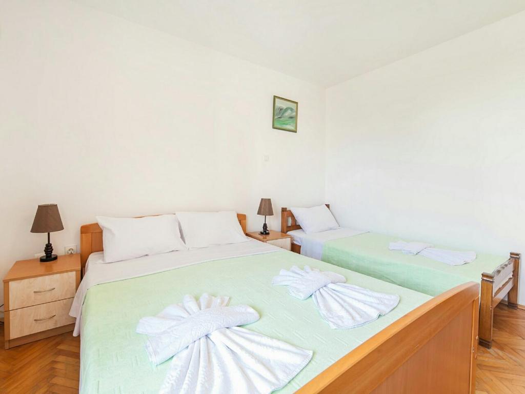 Postel nebo postele na pokoji v ubytování Hana Accommodation