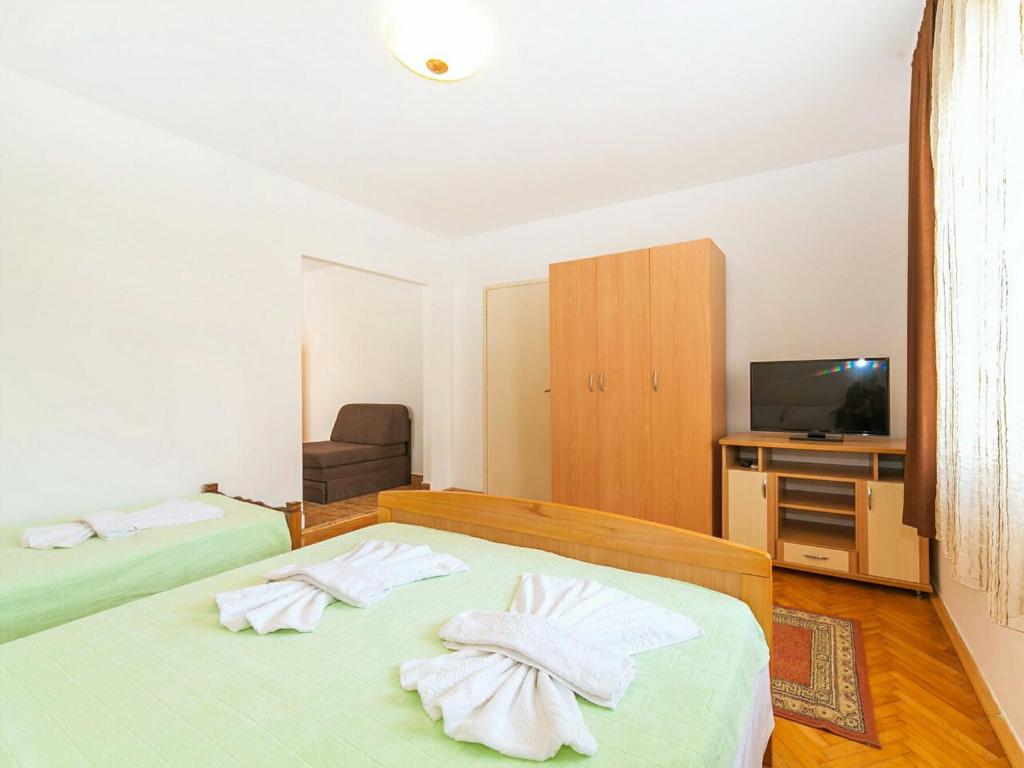 TV a/nebo společenská místnost v ubytování Hana Accommodation