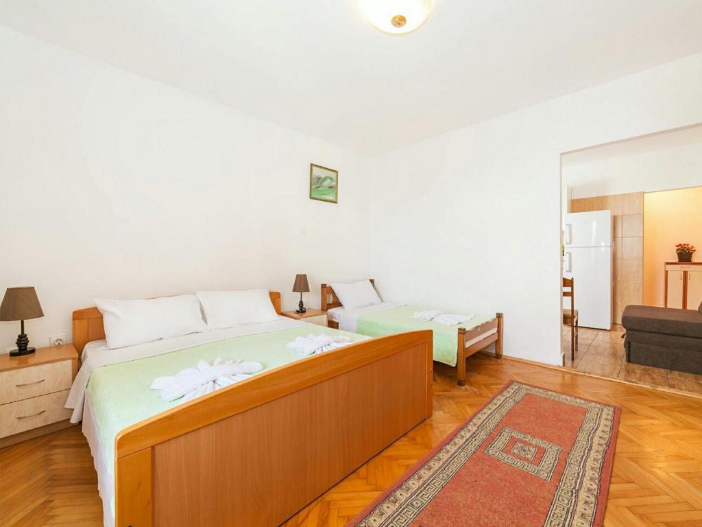 Postel nebo postele na pokoji v ubytování Hana Accommodation