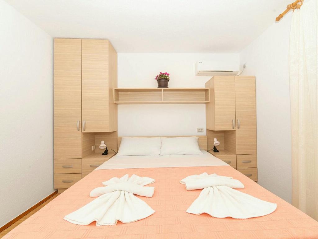 Postel nebo postele na pokoji v ubytování Hana Accommodation