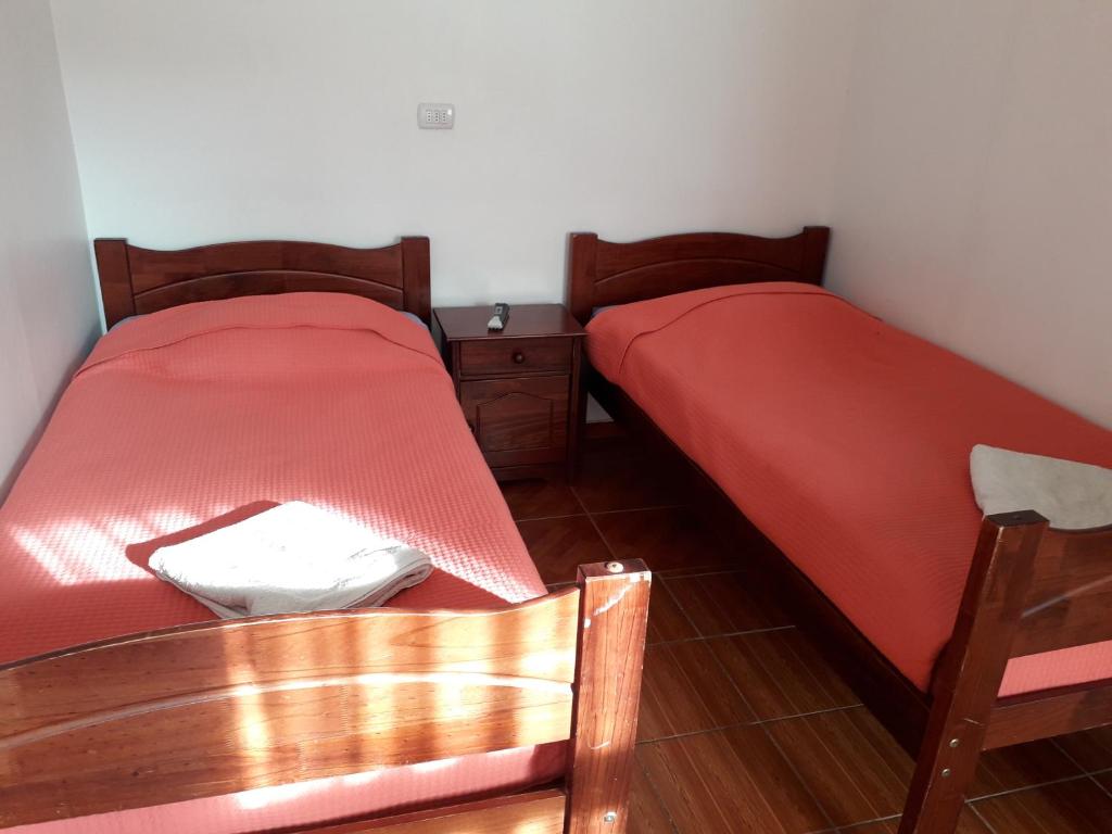 Postel nebo postele na pokoji v ubytování Hostal Las Kañas