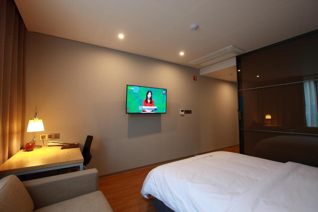 Postel nebo postele na pokoji v ubytování Mini Hotel 141
