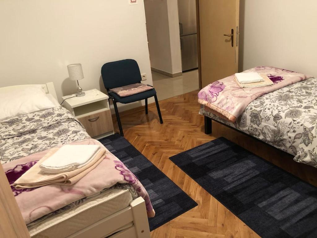 Postel nebo postele na pokoji v ubytování Apartment Dada