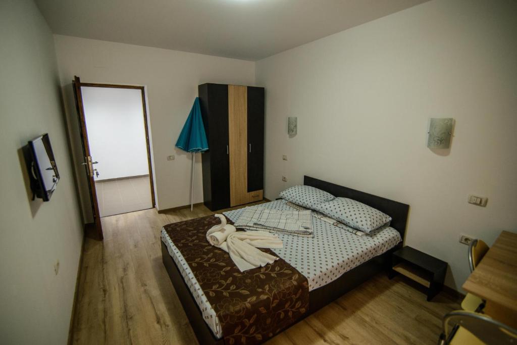 Postel nebo postele na pokoji v ubytování Vila Onasis