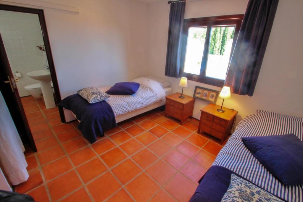 Postel nebo postele na pokoji v ubytování Argentario-4 - sea view villa with private pool in Benissa