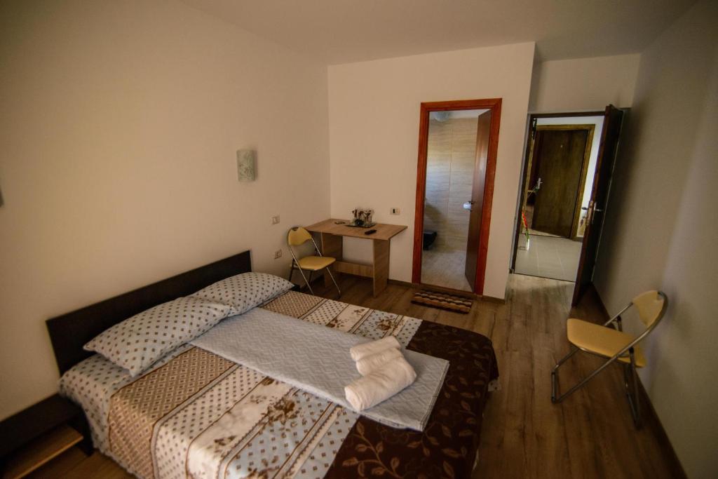 Postel nebo postele na pokoji v ubytování Vila Onasis