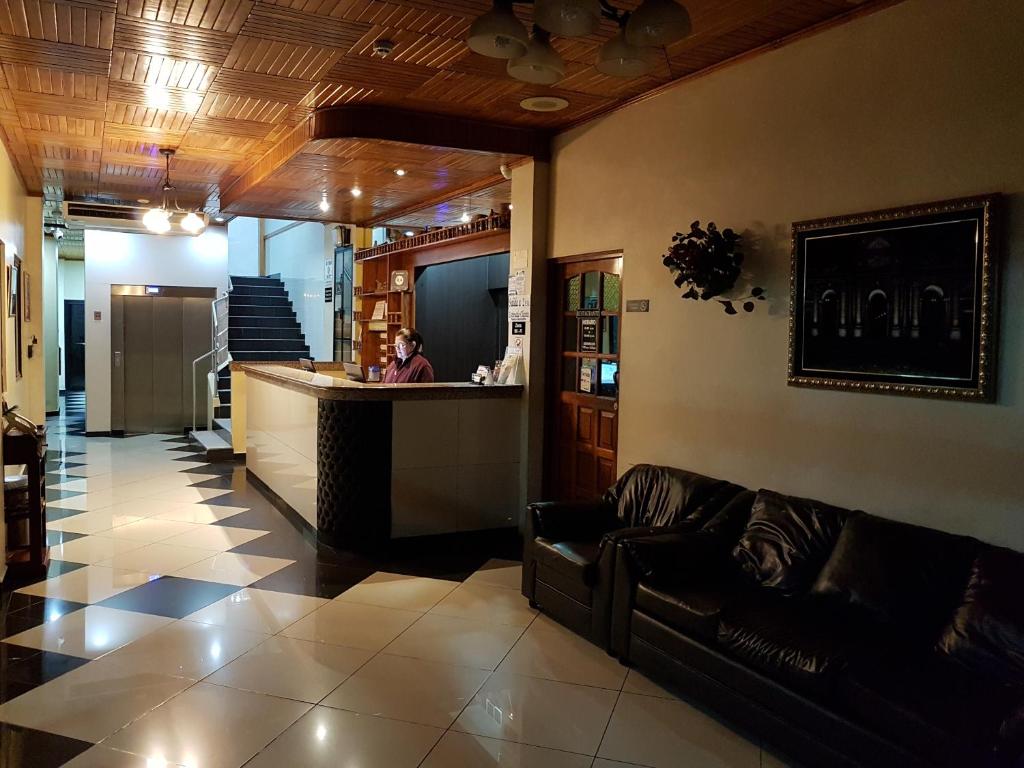 TV a/nebo společenská místnost v ubytování Hotel Alcala