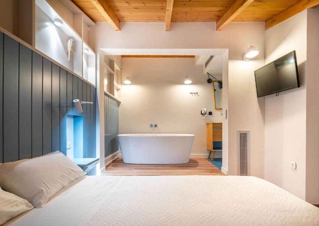 Posteľ alebo postele v izbe v ubytovaní Allure Central Boutique Hotel