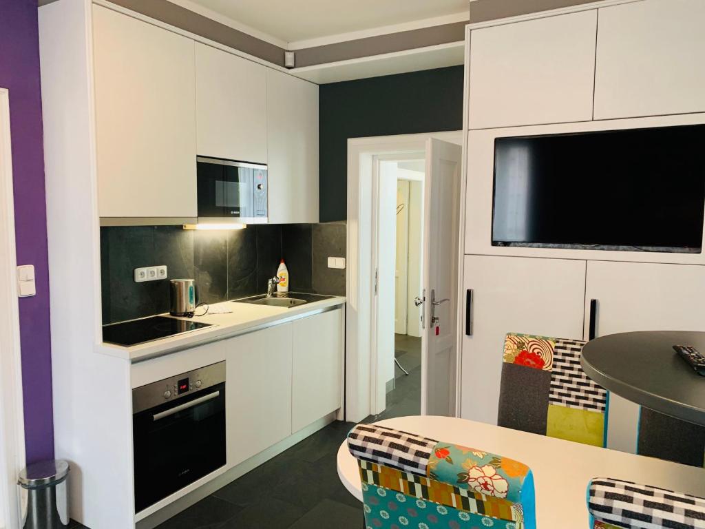 Kuchyň nebo kuchyňský kout v ubytování Apartment Sejko