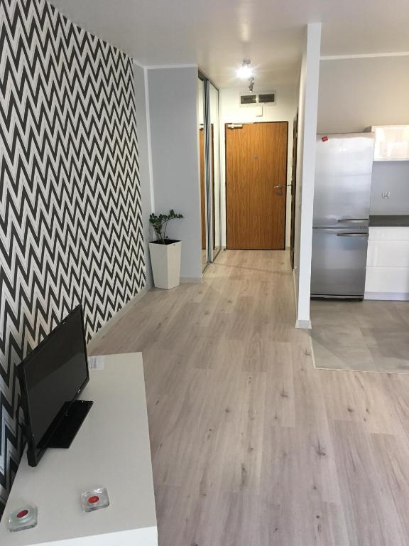 Kuchyň nebo kuchyňský kout v ubytování JAB Apartments Bandurskiego Business & Family