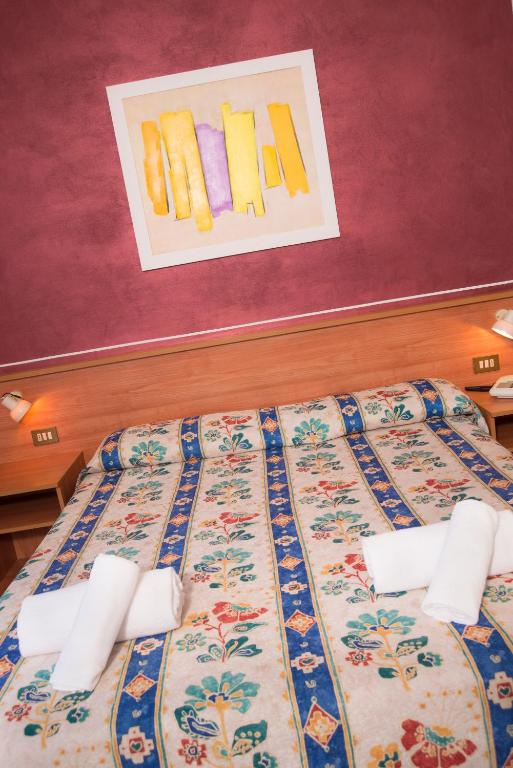 Postel nebo postele na pokoji v ubytování Hotel Antille e Azzorre