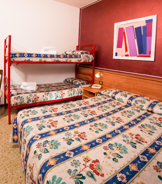 Postel nebo postele na pokoji v ubytování Hotel Antille e Azzorre