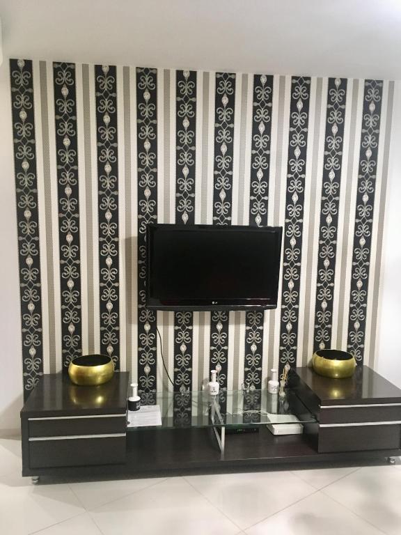 TV a/nebo společenská místnost v ubytování JAB Apartments Bandurskiego Business & Family