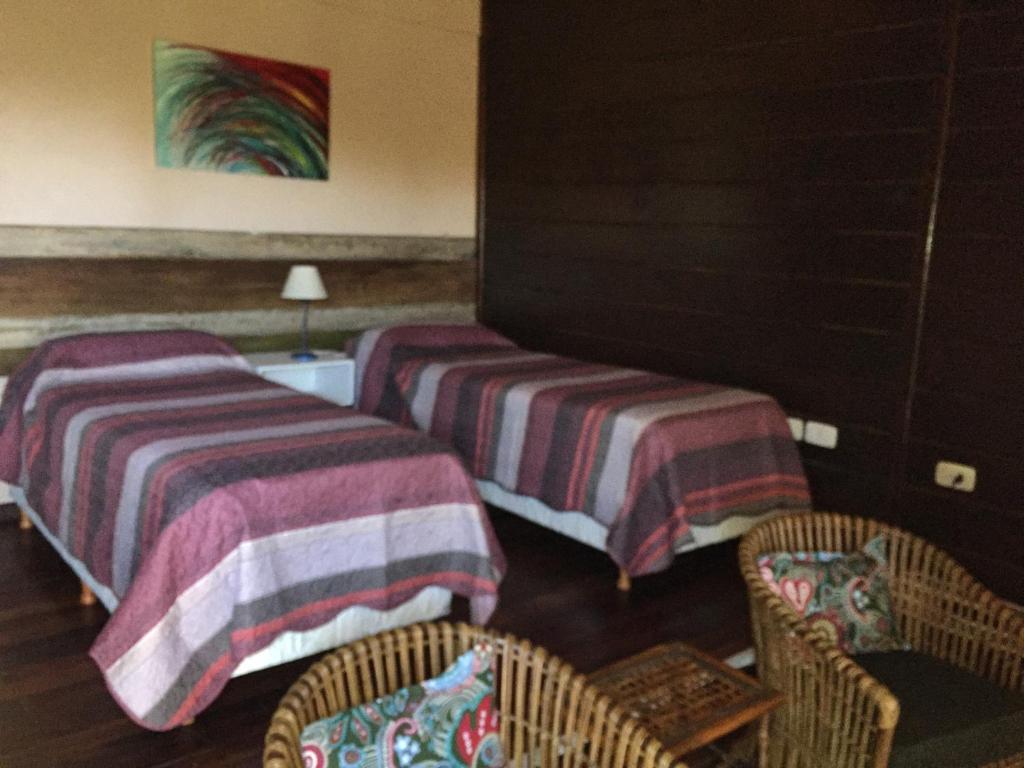 Postel nebo postele na pokoji v ubytování Al Kamar Cabañas Lodge