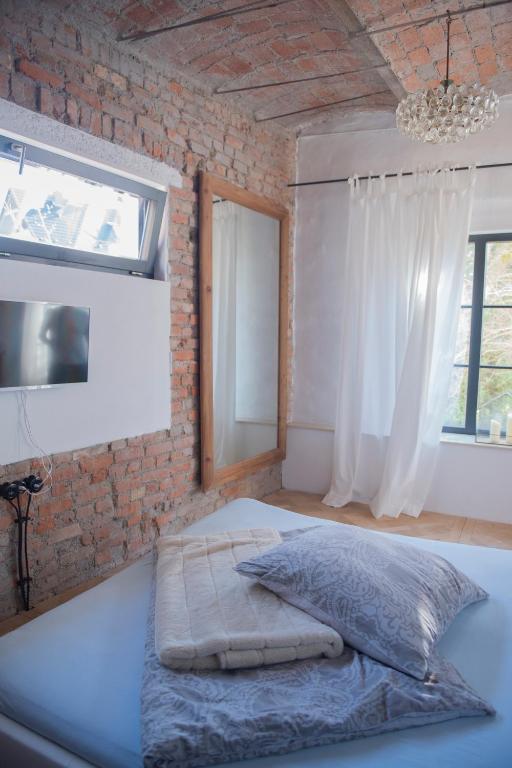 Postel nebo postele na pokoji v ubytování Freiraum Loft