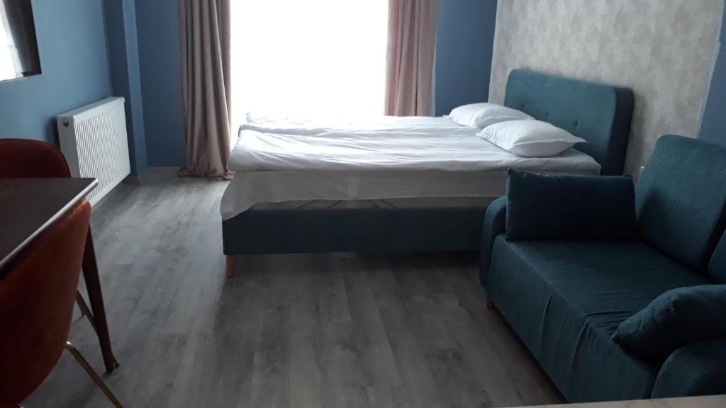 Postel nebo postele na pokoji v ubytování Новый Гудаури Loft 2