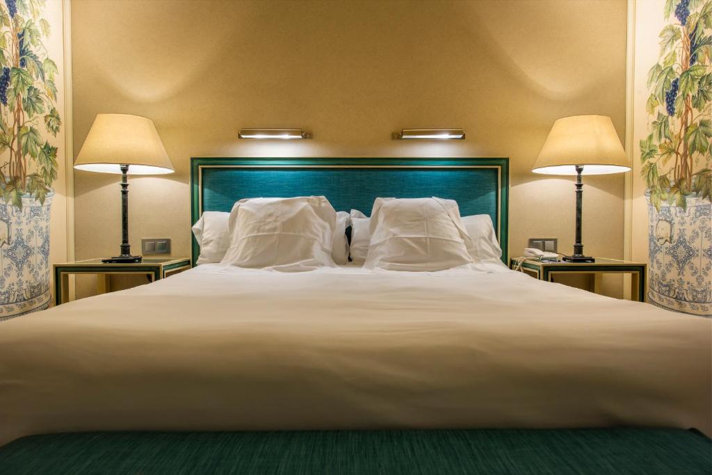 Postel nebo postele na pokoji v ubytování Hotel Casa Del Poeta