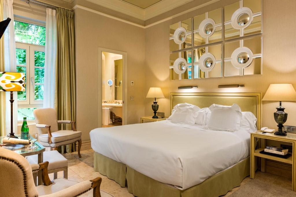 Postel nebo postele na pokoji v ubytování Hotel Casa Del Poeta