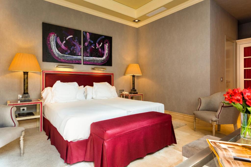 Postel nebo postele na pokoji v ubytování Hotel Casa Del Poeta
