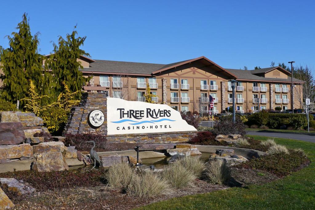 a sign for a three rivers apartment building at Three Rivers Casino Resort in Florence