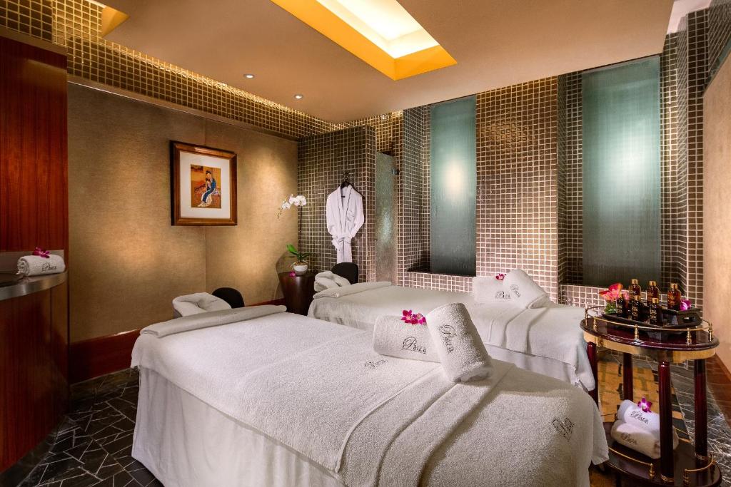 Postel nebo postele na pokoji v ubytování Sands Macao