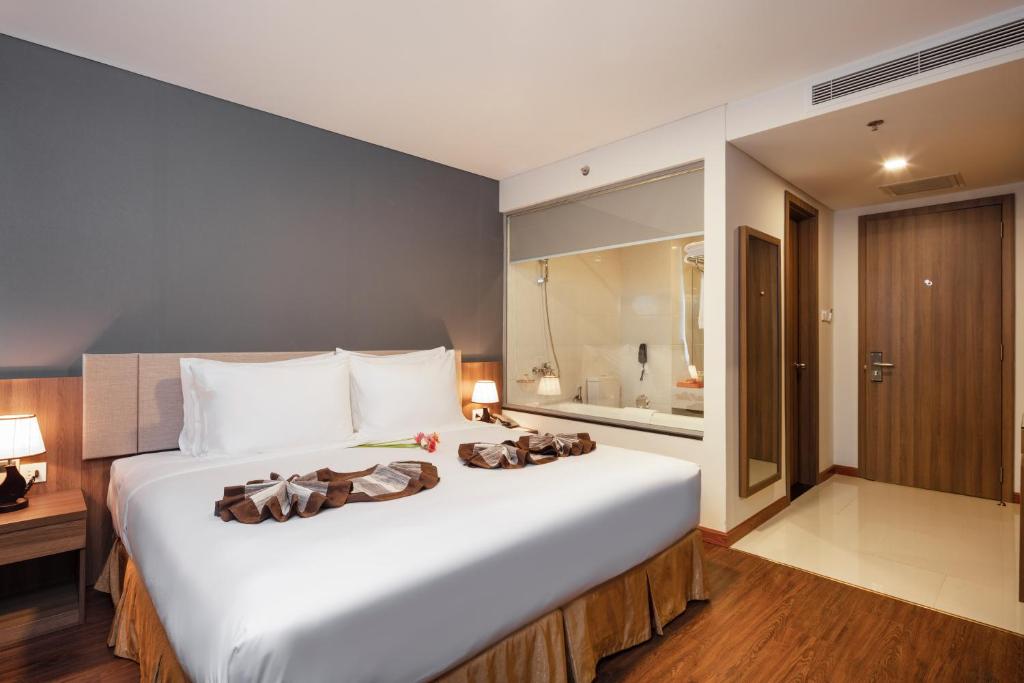 Phòng Deluxe Đôi hoặc 2 giường đơn nhìn ra 1 góc biển