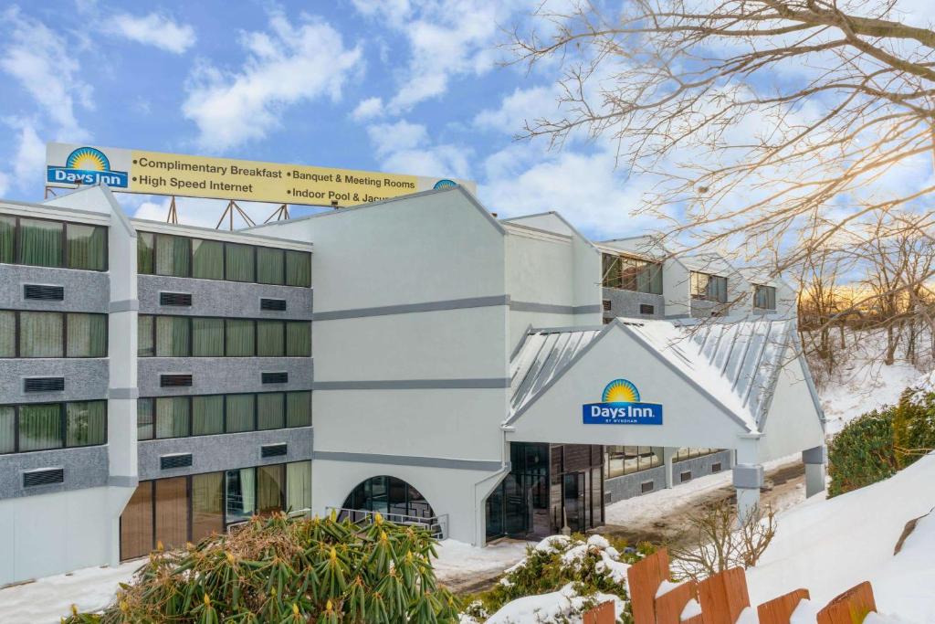 a rendering of the exterior of a hotel at Days Inn by Wyndham Scranton PA in Dickson City