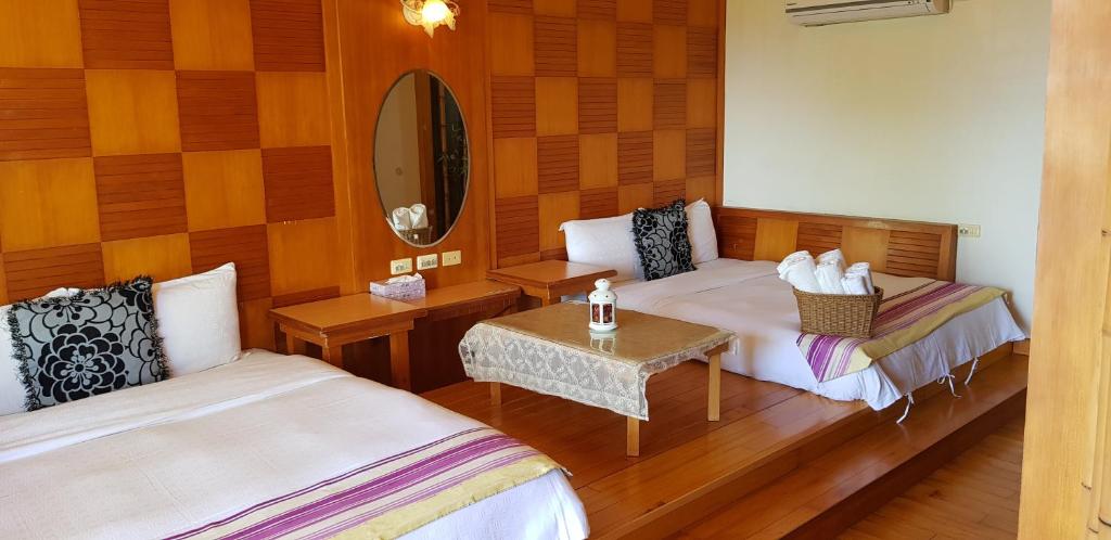 Postel nebo postele na pokoji v ubytování Ming Jun Homestay