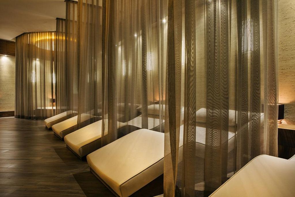 Postel nebo postele na pokoji v ubytování Nirvana Mediterranean Excellence - Ultra All Inclusive