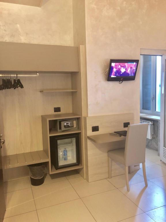 TV a/nebo společenská místnost v ubytování Hotel Bolzano