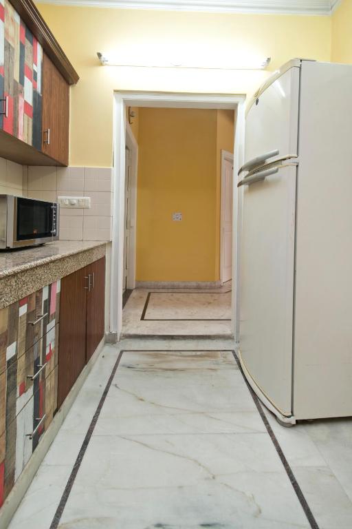 Kuchyň nebo kuchyňský kout v ubytování Prakash Kutir B&B