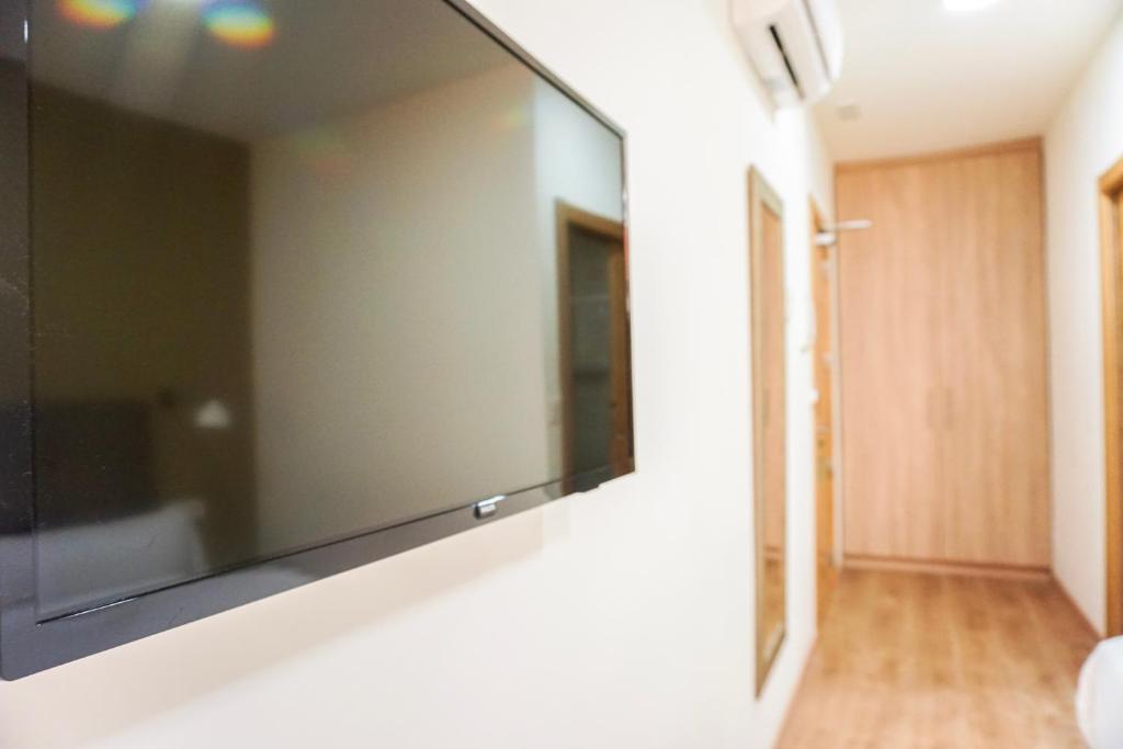 TV a/nebo společenská místnost v ubytování Hotel Lidar