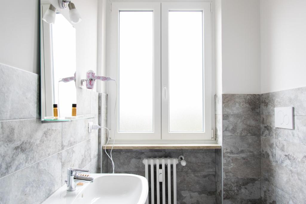 Un baño de Posada Verona Hostel