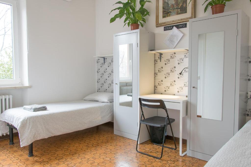 Cama o camas de una habitación en Posada Verona Hostel