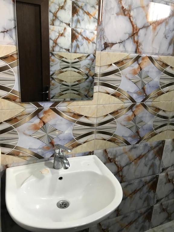 Koupelna v ubytování Guest house BAGRATIONI