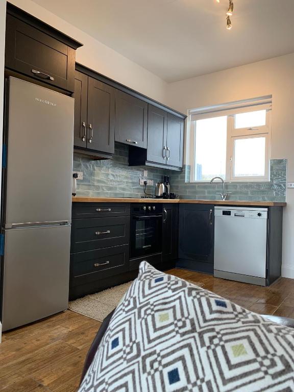 Kuchyň nebo kuchyňský kout v ubytování Zepher Apartment