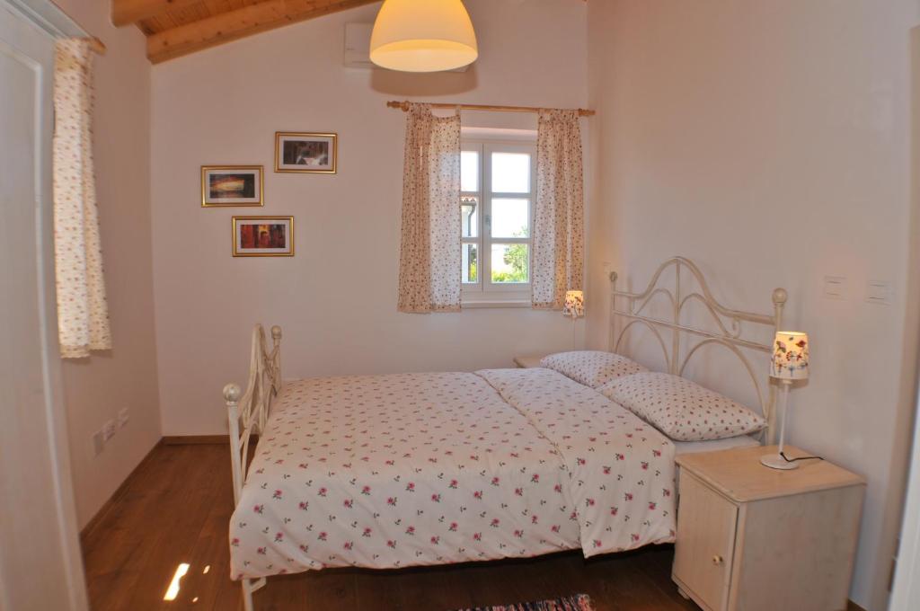 Postel nebo postele na pokoji v ubytování Villa Petra