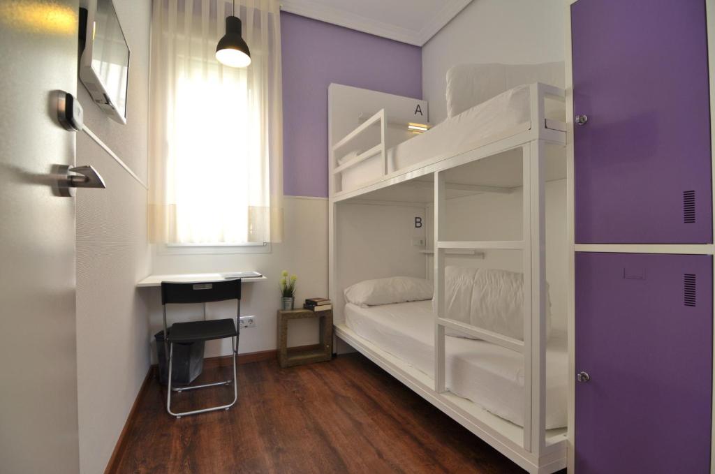 Cama o camas de una habitación en Far Home Bernabeu