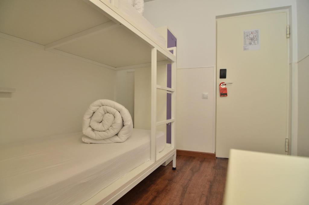 Cama o camas de una habitación en Far Home Bernabeu