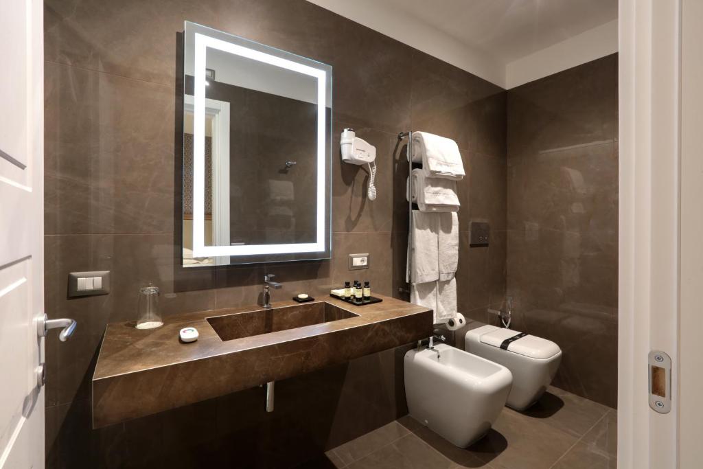 Łazienka w obiekcie Caruso Place Boutique & Wellness Suites