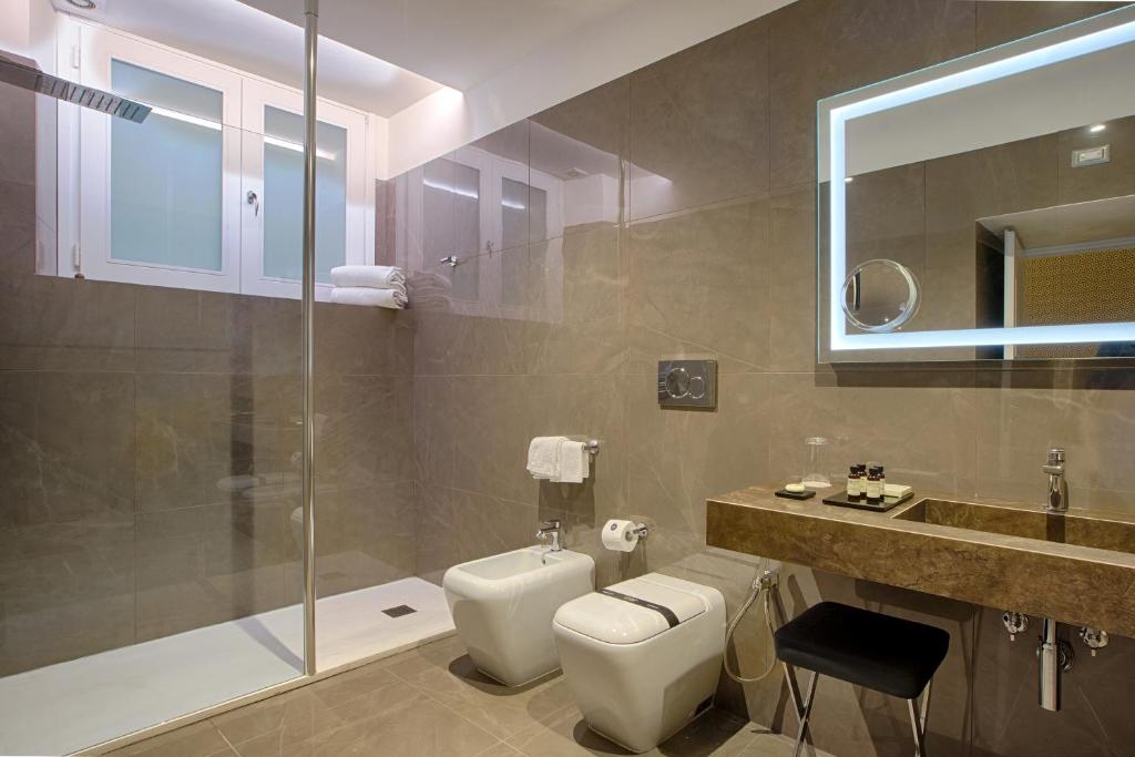 Łazienka w obiekcie Caruso Place Boutique & Wellness Suites