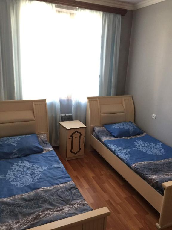 Postel nebo postele na pokoji v ubytování Arm Hostel